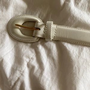 Women’s white leather belt.